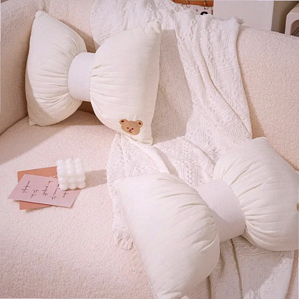 Schmetterling Schleifenkissen cremeweiß Schleifenform Kuschelkissen süß